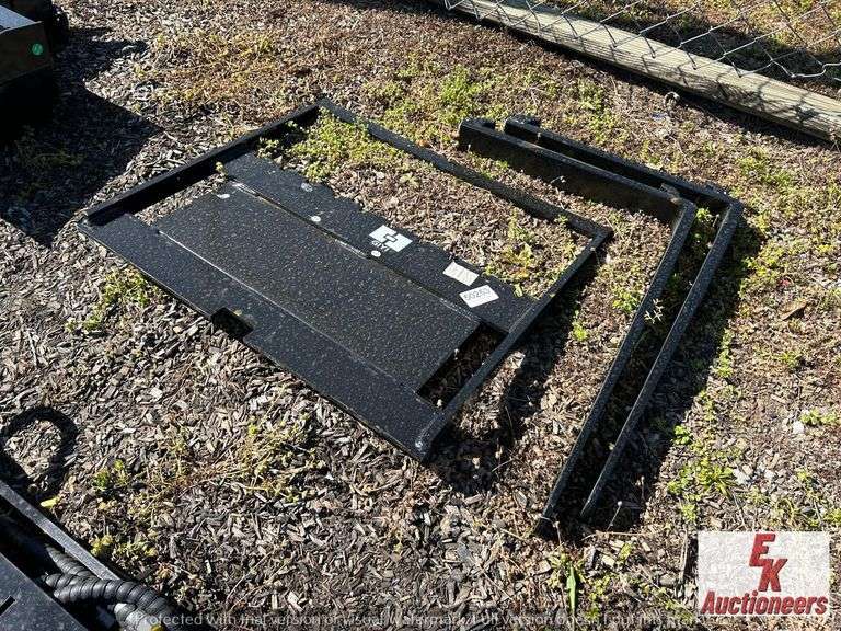 UNUSED PALLET FORKS FOR WALK BEHIND SKID STEER