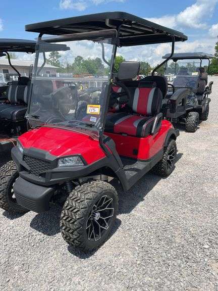 UNUSED LIFTED 4 SEATER GOLF CART--WILL NOT TAKE CHARGE