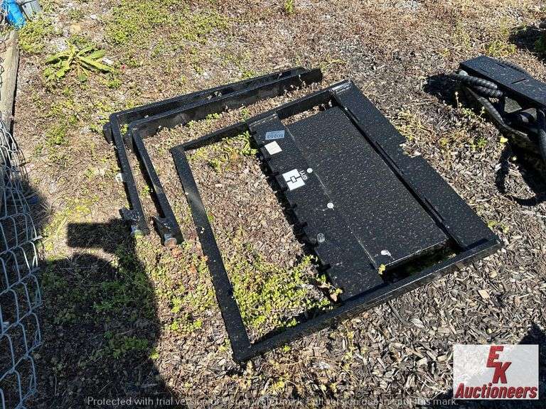 UNUSED PALLET FORKS FOR WALK BEHIND SKID STEER