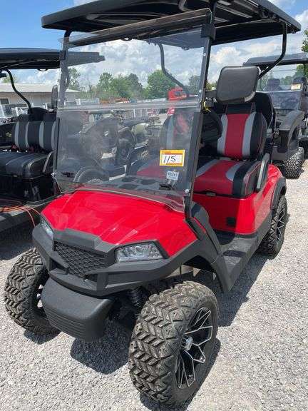 UNUSED LIFTED 4 SEATER GOLF CART--WILL NOT TAKE CHARGE