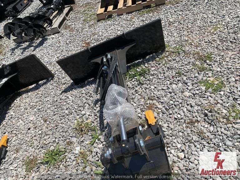 UNUSED SKIDSTEER BACKHOE ATTACHMENT
