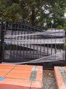 UNUSED 20' BI-PARTING WROUGHT IRON GATES