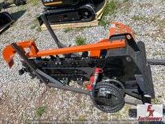 UNUSED WALK BEHIND SKIDSTEER TRENCHER