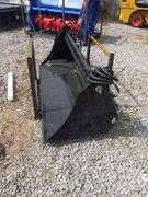 UNUSED SKID STEER 4-IN-1 BUCKET