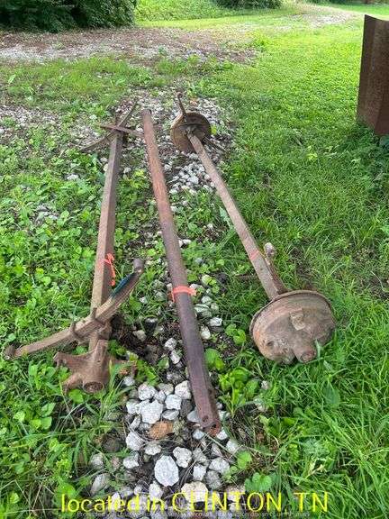 (2) TRAILER AXLES WITH TONGUE--ONE IS A BRAKE AXLE