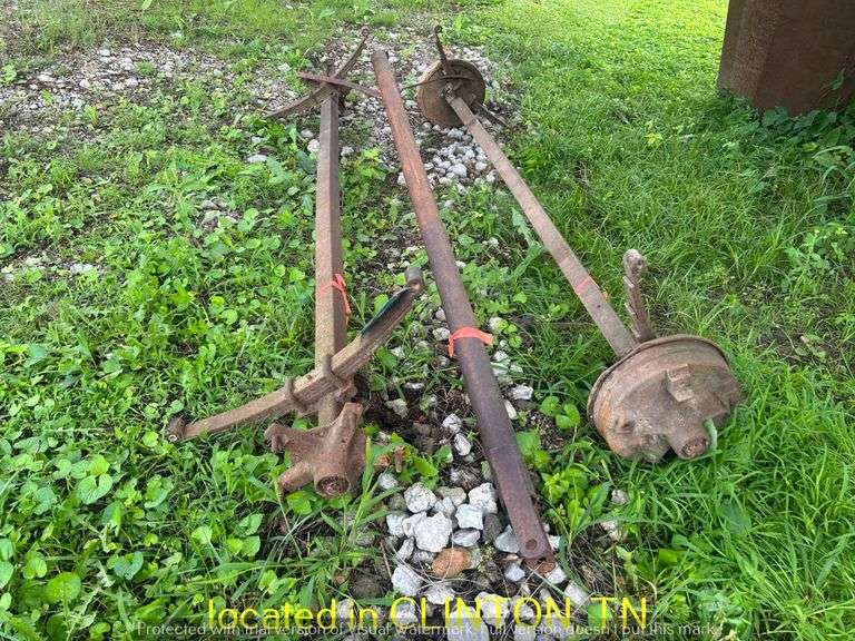 (2) TRAILER AXLES WITH TONGUE--ONE IS A BRAKE AXLE
