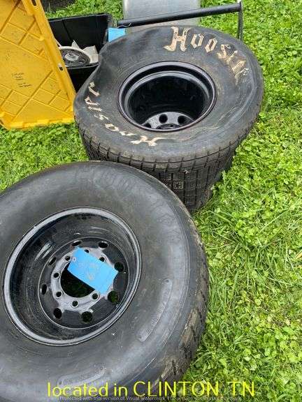 (2) HOOSIER 105/16.0-15 DIRT SLICKS WITH 8LUG RIMS