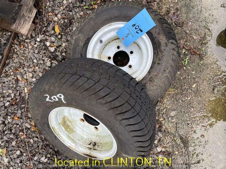 (2) 205/65-10 MOWER TIRES WITH RIMS