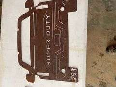 (2) STEEL CUTOUTS OF FORD & SUPER DUTY