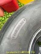 (2) HOOSIER 105/16.0-15 DIRT SLICKS WITH 8LUG RIMS