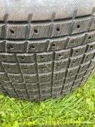 (2) HOOSIER 105/16.0-15 DIRT SLICKS WITH 8LUG RIMS