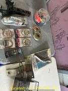 ASSORTED HITCHES AND TRAILER PARTS