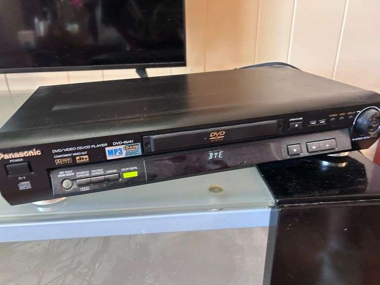 PANASONIC DVD PLAYER WITH MREMOTE AND ASST DVDS