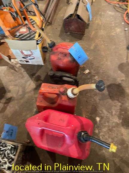 QTY (3) PLASTIC GAS CANS AND PARTIAL JUG OF CHAIN BAR OIL