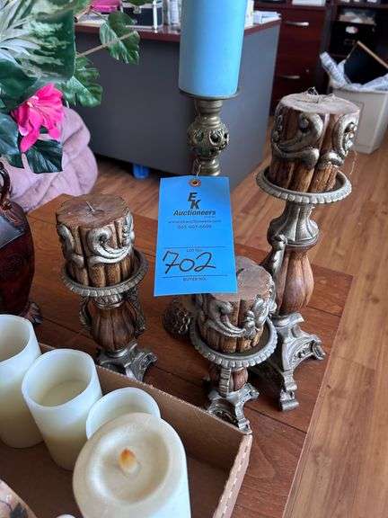 CANDLE STICKS AND CANDLES AND VASE OF ARTIFICIAL FLOWERS