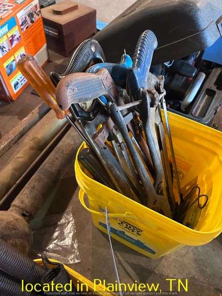 BUCKET OF HACKSAWS AND SCREWDRIVERS