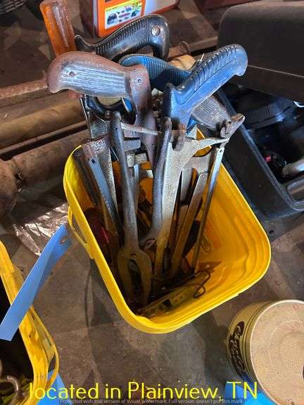 BUCKET OF HACKSAWS AND SCREWDRIVERS