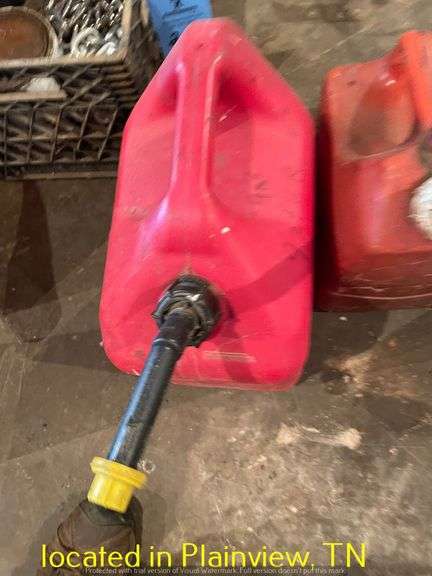 QTY (3) PLASTIC GAS CANS AND PARTIAL JUG OF CHAIN BAR OIL