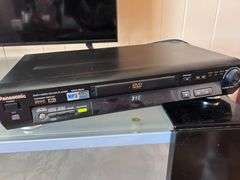 PANASONIC DVD PLAYER WITH MREMOTE AND ASST DVDS