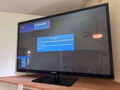 SAMSUNG TV 54.5X33 WITH REMOTE