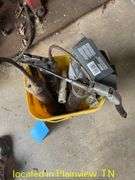 BUCKET OF GREASE GUNS