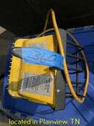 TUB OF ELECTRIC CORDS & FLOOD LIGHT-POWERED ON
