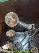 UNUSED METAL MEASURING CUPS AND SPOONS AND SALT AND PEPPER SHAKERS