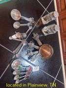 UNUSED METAL MEASURING CUPS AND SPOONS AND SALT AND PEPPER SHAKERS
