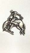 Vintage silvertone cowboy on bucking bronco pin