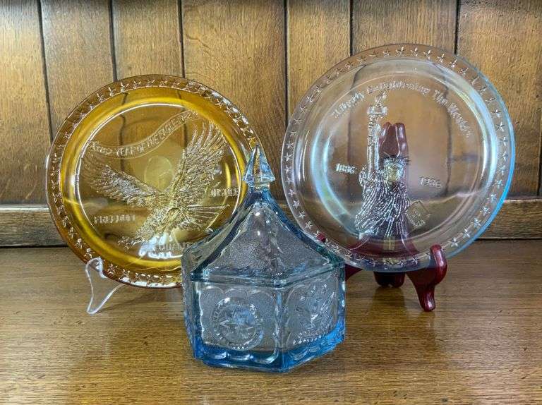 Tiara Indiana Glass Ice Blue Colonial Eagle and Stars Candy Box, Tiara Exclusives Year of the Eagle 1782-1982 Amber Plate & Tiara Glass Liberty Enlightening The World Collector Plate