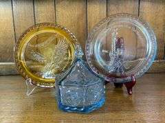 Tiara Indiana Glass Ice Blue Colonial Eagle and Stars Candy Box, Tiara Exclusives Year of the Eagle 1782-1982 Amber Plate & Tiara Glass Liberty Enlightening The World Collector Plate