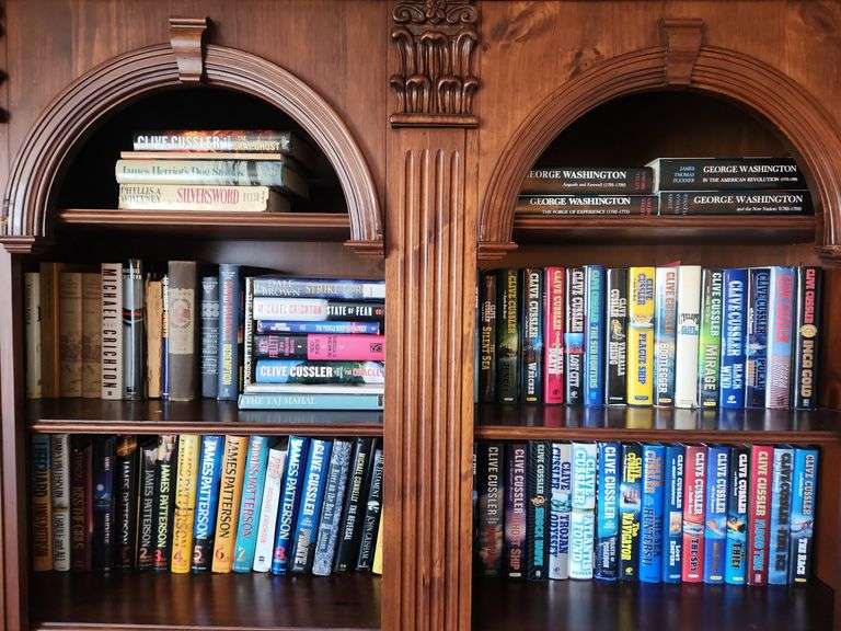3 Shelf Lot of Books - Clive Cussler, Michael Crighton, James Patterson and Others