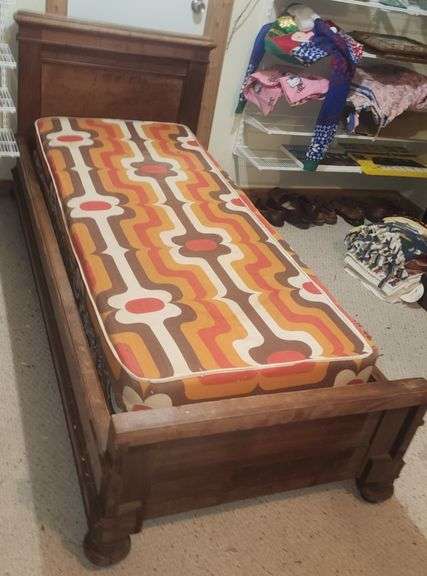 Vintage 1800's servent bed with colorful mattress