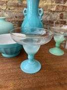 Log of Teal Colored Dishes and Pottery