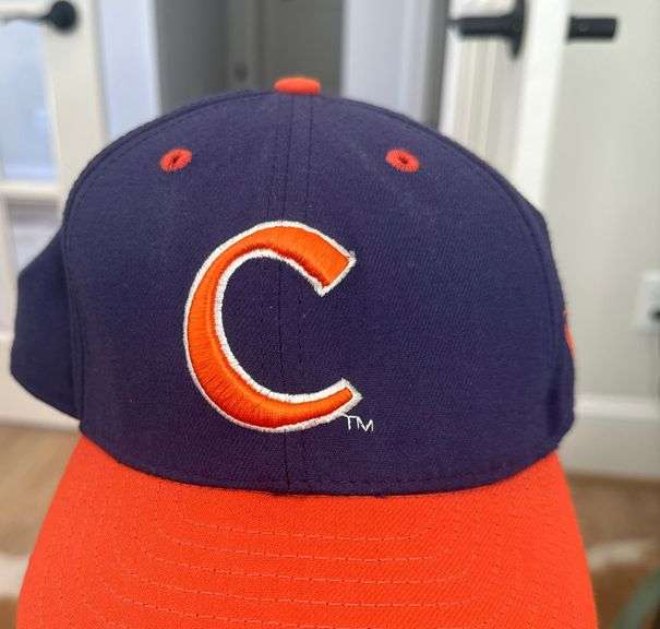 Stanley Cup and Clemson blanket and hat