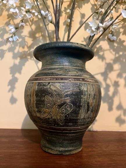 Vase with artificial flowers