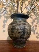 Vase with artificial flowers