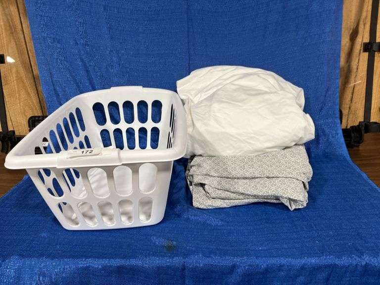 Sheets and laundry basket