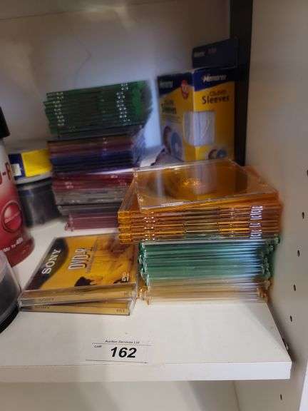 DVDs, cases, and paper sleeves