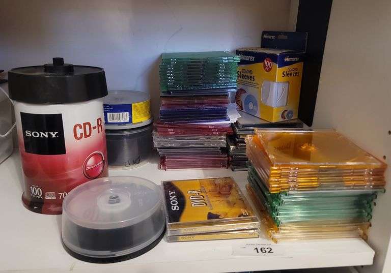 DVDs, cases, and paper sleeves