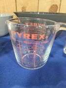 Mixing bowls and Pyrex measuring cup