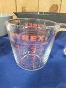 Mixing bowls and Pyrex measuring cup