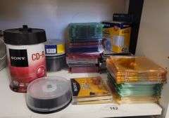 DVDs, cases, and paper sleeves