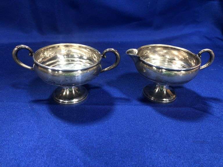 Sterling silver weighted creamer and sugar bowl