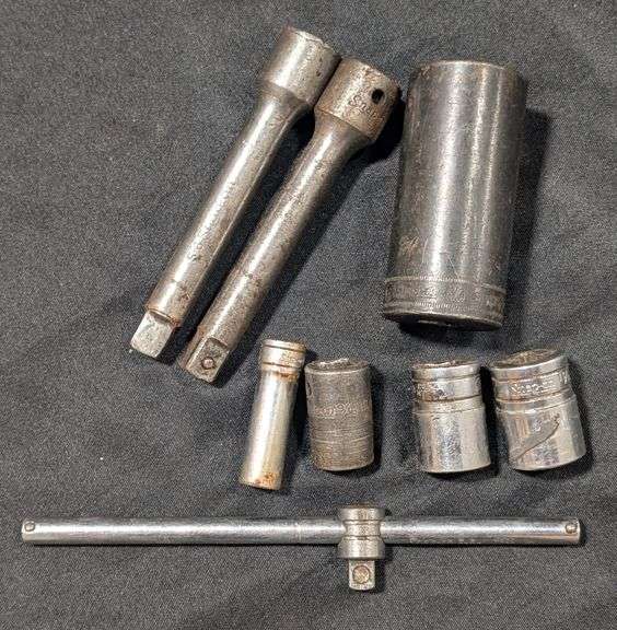 Snap-on sockets, extensions, and a sliding T-handle breaker bar