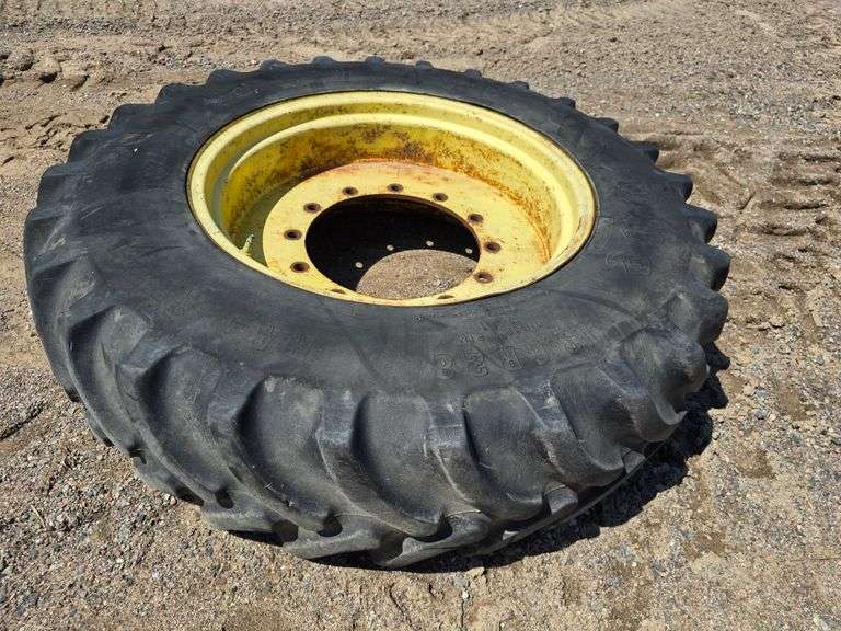 (1) 13.6R28 Firestone on 12 Bolt Yellow John Deere Rims