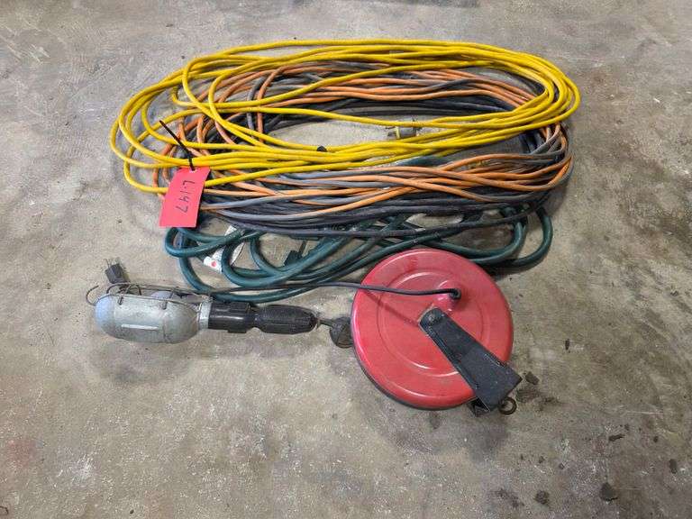Assortment of Extension Cords and Retracting Trouble Light