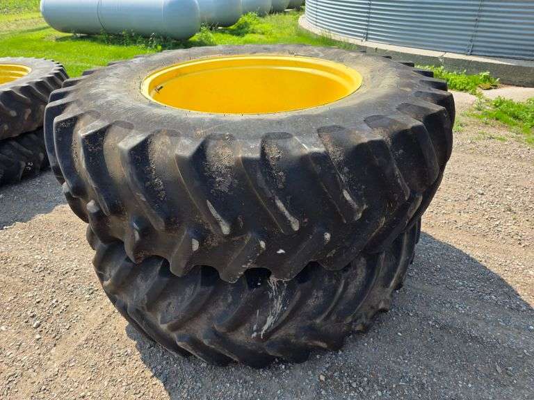 (2) 20.8R38 Duals on Yellow John Deere Dual Rims