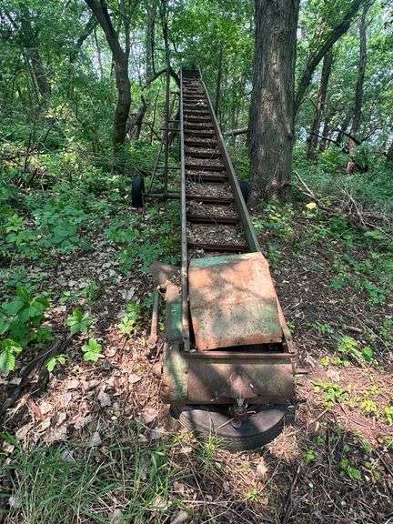 Older John Deere Flight Elevator
