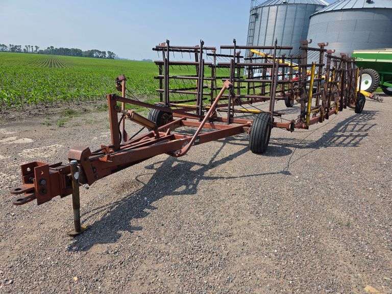 Melroe Model 452 – 12 Section 6' Coil Tine Drag, Hydraulic Down, SN: 661275